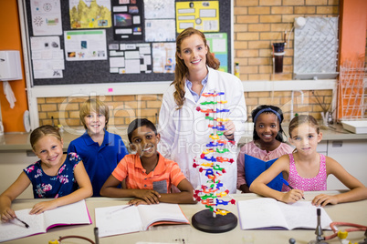 Teacher posing with her students