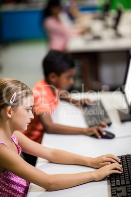 Children looking their computer