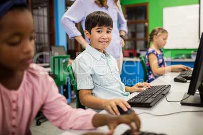 Children looking their computer