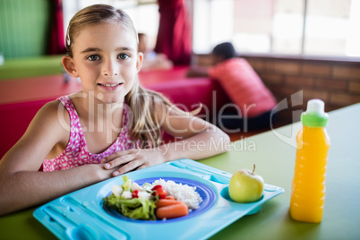 Child posing at the canteen