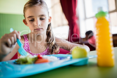 Child eating at the canteen