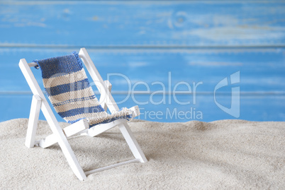 Summer Greeting Card With Deck Chair And Sand