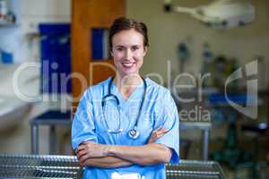 Portrait of woman vet crossing her arms