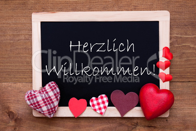 Blackboard With Textile Hearts, Text Willkommen Means Welcome