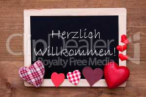 Blackboard With Textile Hearts, Text Willkommen Means Welcome