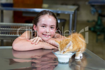 A kitten drinking milk