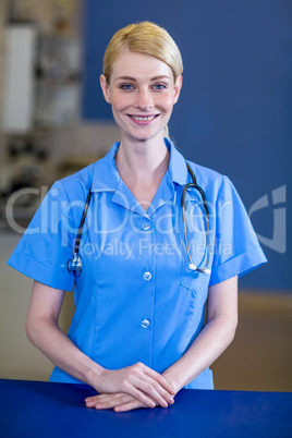 Portrait of woman vet smiling and posing