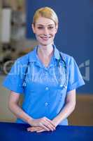 Portrait of woman vet smiling and posing