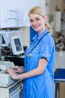 Portrait of woman vet smiling and posing