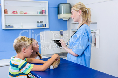 A woman vet using her tablet computer