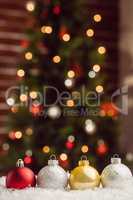 Composite image of Christmas bauble lined up