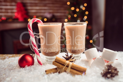 close up view of composite image of hot chocolates against Chri
