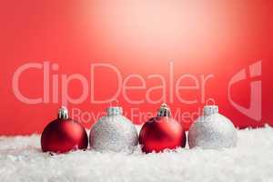 Composite image of Christmas baubles lined up