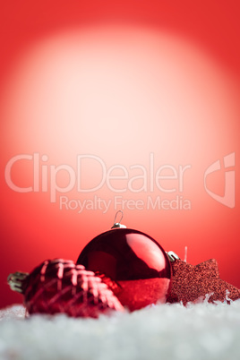 Composite image of Christmas bauble and decoration