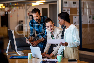 young business people working at computer desk