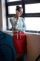 An attractive businesswoman having a phone call