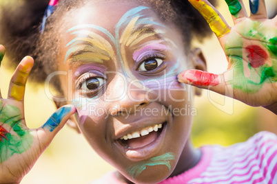 Portrait of cute girl with make up smiling to the camera