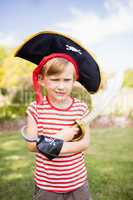 Portrait of cute boy pretending to be a pirate