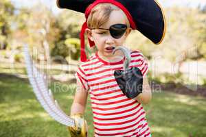 Portrait of cute boy pretending to be a pirate