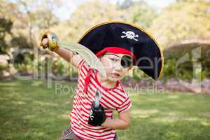 Portrait of cute boy pretending to be a pirate