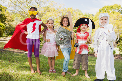 Children with fancy dress smiling and posing