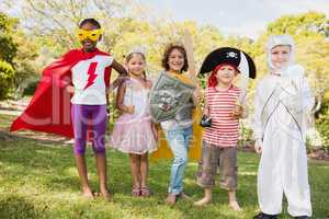 Children with fancy dress smiling and posing