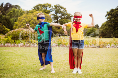 Children with superhero dress posing