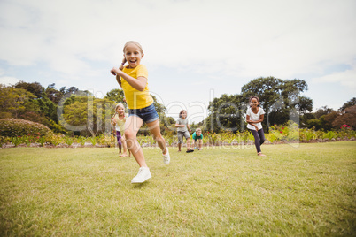 Children smiling and running