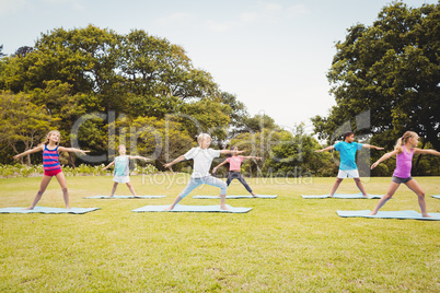 Group of children doing yoga