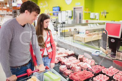 Couple doing their groceries