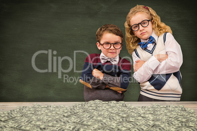 Composite image of cute pupils looking at camera