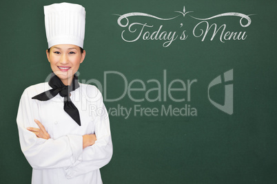 Composite image of woman chef smiling