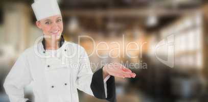 Composite image of portrait of a woman chef holding out her hand