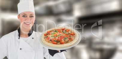 Composite image of portrait of a woman chef holding a pizza