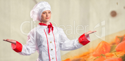 Composite image of pretty chef standing with hands out