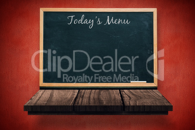 Composite image of blackboard with todays menu message