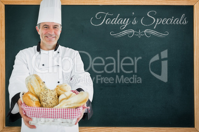 Composite image of chef smiling and holding a bread basket