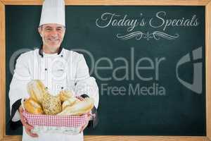 Composite image of chef smiling and holding a bread basket