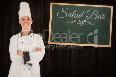 Composite image of friendly woman chef smiling and crossed arms