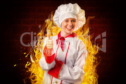 Composite image of pretty chef showing thumbs up