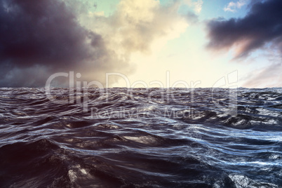 Composite image of blue rough ocean