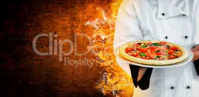 Composite image of male chef offering pizza