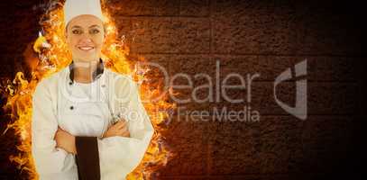 Composite image of woman chef smiling and crossed arms