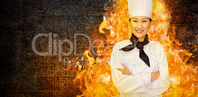 Composite image of portrait of smiling female cook in kitchen