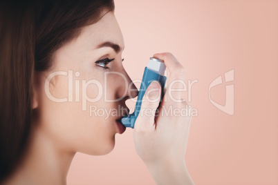 Composite image of portrait of an asthmatic woman