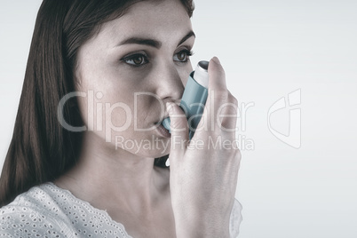 Composite image of portrait of an asthmatic woman