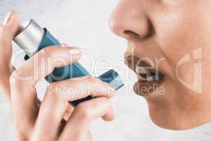 Composite image of close up on an asthmatic woman