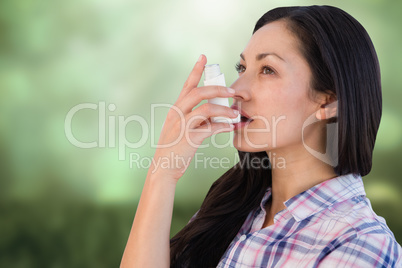 Composite image of portrait of an asthmatic woman