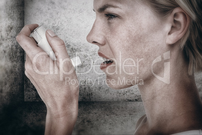 Composite image of asthmatic pretty blonde woman using inhaler