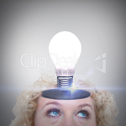 Composite image of close up of pretty blonde woman looking up